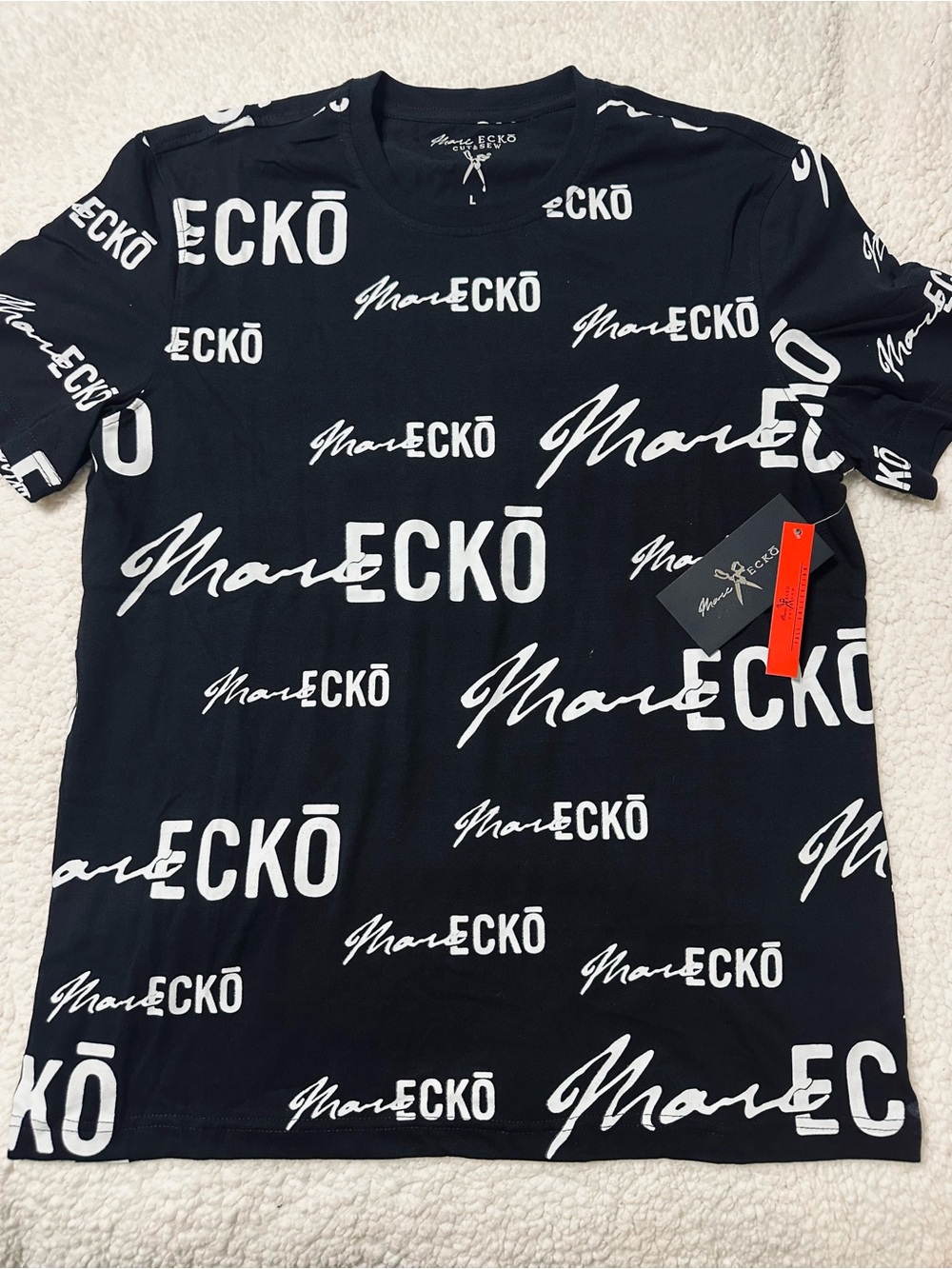 Marc Ecko Black Tee with All-Over White Logo Print